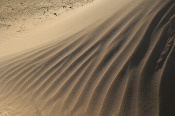 Texture of sand and earth, sand dunes and mountains