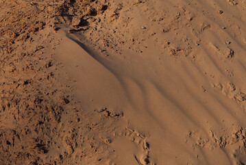 Texture of sand and earth, sand dunes and mountains