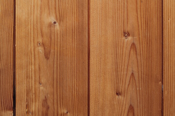 A wooden surface with a grainy texture
