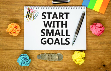 Start with small goals symbol. Concept words phrase Start with small goals on beautiful white note....