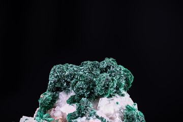 green Malachite on white Calcite. Specimen from Tsumeb mine, Namibia. macro photography detail texture background. close-up mineral crystal unpolished semi-precious gemstone
