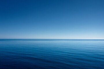 Obraz premium Vast Blue Ocean Under a Clear Summer Sky
