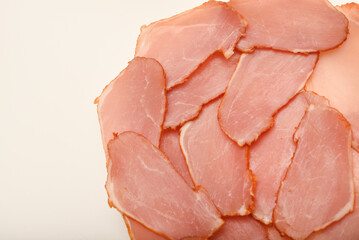 Ham cut into thin slices.