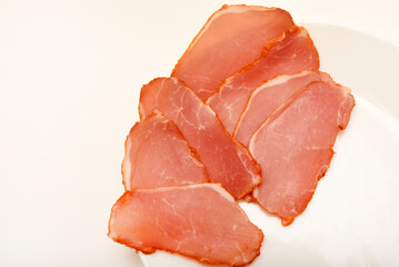 Ham cut into thin slices.