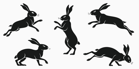 Obraz premium Black Silhouette Rabbits in Motion, Minimalist Art, Jumping Hares