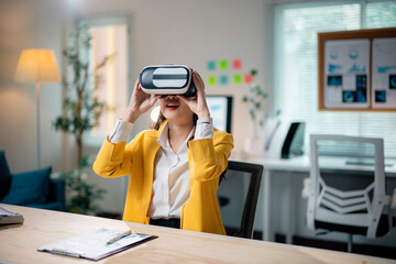 Businesswoman wearing virtual reality headset in modern office
