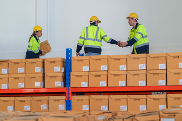 Warehouse worker working in warehouse storage. Foreman or worker work at factory site check up...