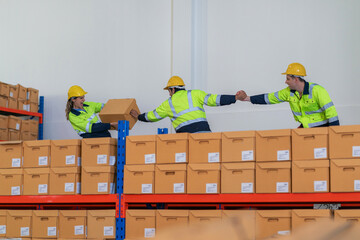 Warehouse worker working in warehouse storage. Foreman or worker work at factory site check up...