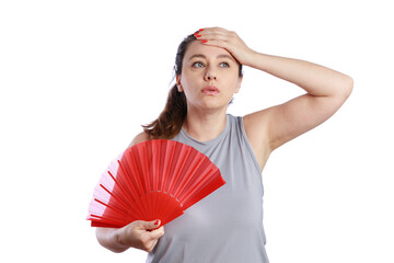 Woman cooling down using red hand fan