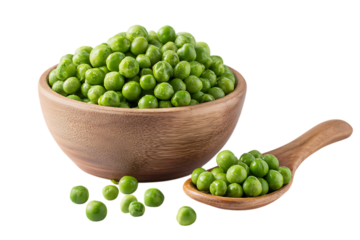 Fresh green peas in a wooden bowl and spoon