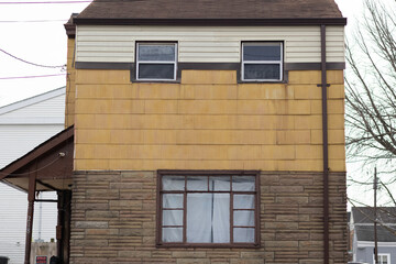 facade of old house that looks like a face