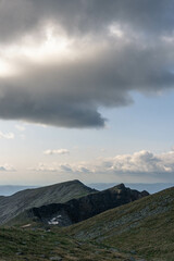 mountain peaks landscape with clouds rocky
