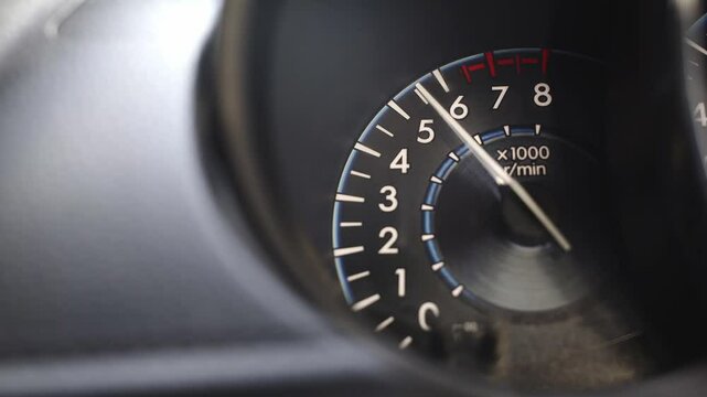 Close-Up of Car Speedometer Accelerating from 0 to Maximum &ndash; Vehicle Dashboard in Motion