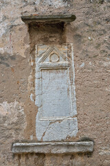 Ancient roman stone inscription in Euphrasian basilica, Porec, Croatia.