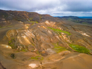 Aerial drone view of small volcanic Krafla lake with azure water, Iceland