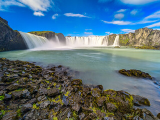Godafoss waterfall with colorful sunset sky in summer at Iceland