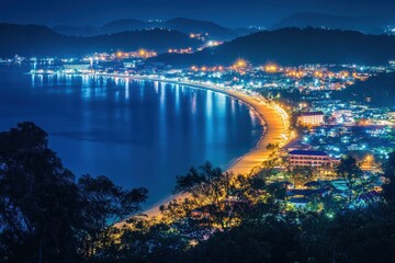 Stunning nighttime view of Nai Harn beach and Promthep on Phuket island, Phuket island night view Nai harn beach and Promthep cape coast aerial