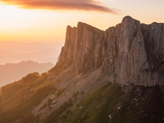 Naklejka premium Above shot of national park Bolshoy Tkhach mountain in Caucasus with sunset tones