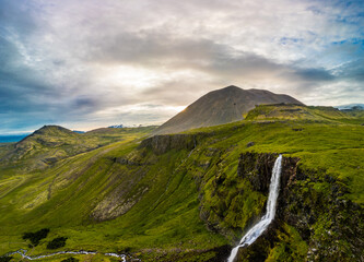 Aerial drone view of a waterfall Bjarnarfoss in Snaefellsnes Peninsula.