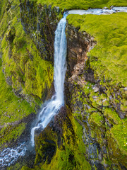 Aerial drone view of a waterfall Bjarnarfoss in Snaefellsnes Peninsula.