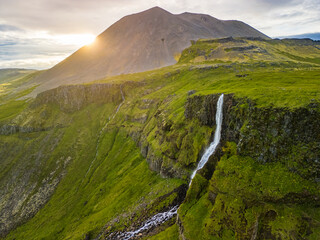 Aerial drone view of a waterfall Bjarnarfoss in Snaefellsnes Peninsula.