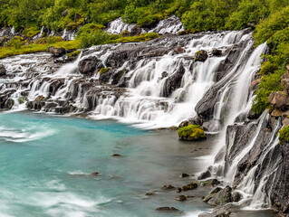 Aerial drone view of Barnafoss and Hraunfossars waterfall in west Iceland