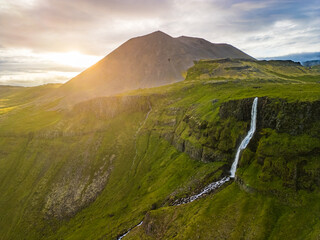 Aerial drone view of a waterfall Bjarnarfoss in Snaefellsnes Peninsula.