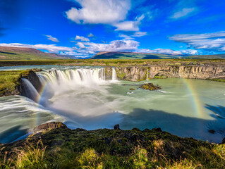 Godafoss waterfall with colorful sunset sky in summer at Iceland