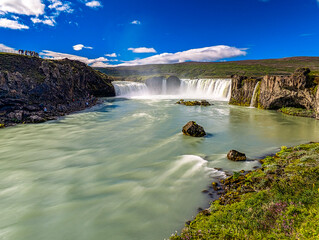 Godafoss waterfall with colorful sunset sky in summer at Iceland