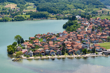 The cozy town of Divic on the bank of the Drina River, surrounded by the Balkan Mountains. Bosnia and Herzegovina