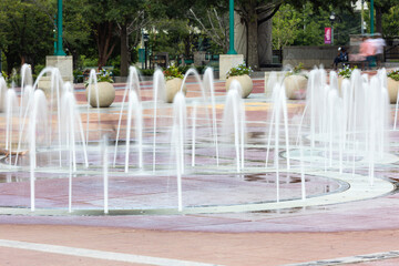 Spurts of water motion blur at Atlanta fountain
