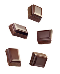 close up of chocolate pieces on white background