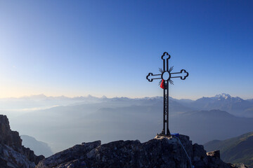 Mountain panorama with summit cross of Grand Muveran and Pennine Alps (Matterhorn, Dent Blanche and...