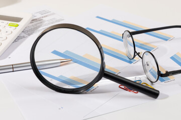 Data Analysis and Financial Report with Charts, Magnifier, Pen, and Calculator – Strategic...
