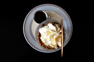 Cup of ice cream with crumble nuts and whipped cream in Keerbergen, Flemish Brabant, Belgium