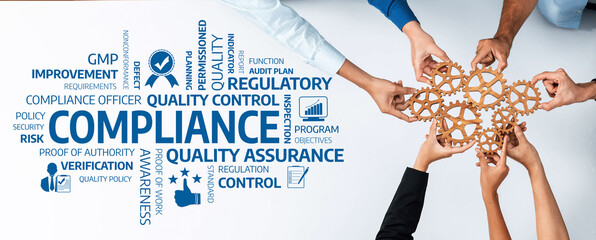 This professional image captures diverse hands uniting over a table, symbolizing collaboration in achieving compliance and quality control within regulatory frameworks. Amity
