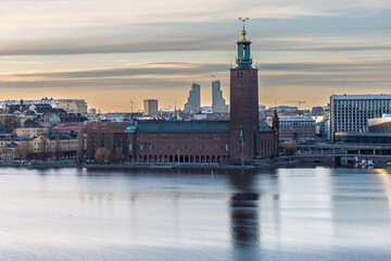 Stockholm City Hall and Old Town skyline reflecting at sunrise