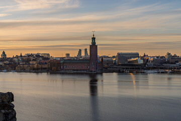 Stockholm City Hall and Old Town skyline reflecting at sunrise
