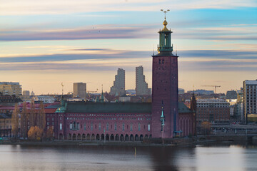 Stockholm City Hall and Old Town skyline reflecting at sunrise