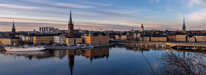 Stockholm City Hall and Old Town skyline reflecting at sunrise