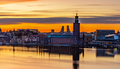Stockholm City Hall beautifully illuminated and reflected at night
