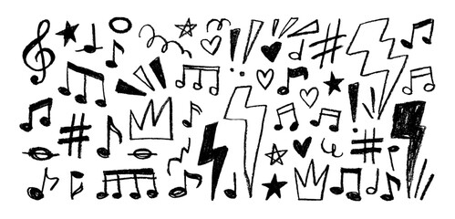 Obraz na płótnie Canvas Crayon drawn music notes, punk lightnings, hearts and stars. Hand drawn graffiti shapes and funky cute doodles.