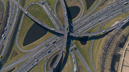 multi level traffic intersection highway, clover leaf, multil lane. Mobility and transport, to pdown photo. Aerial photo.