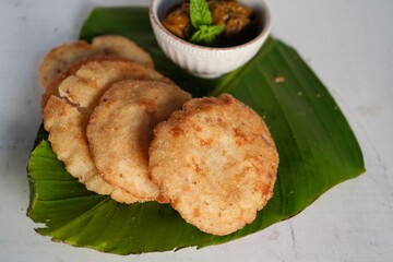 Kerala breakfast Ney pathal or pathiri  served with chicken curry- malabar Iftar foods