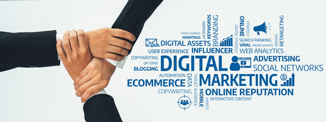 This image depicts hands united in a collaborative effort to enhance digital marketing strategies,...