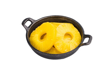 Pineapple ring slices in a bowl isolated on white background. top view