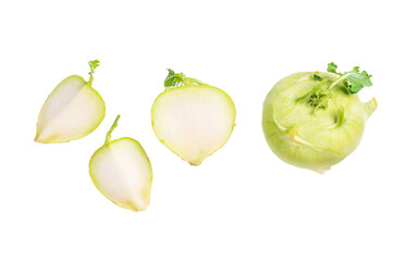 Raw kohlrabi sliced on pieces isolated on white backround. top view