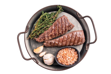 Grilled Mutton tenderloin fillet steak, lamb meat with herbs isolated on white background. top view