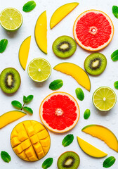 Naklejka premium Natural Microplastic Detox using food, Vibrant Tropical Fruit Blend with Mango, Kiwi, Grapefruit, Lime on White - Ideal for Recipes, Ads, and Healthy Living