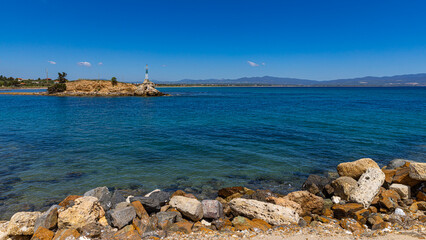 Coastal panorama with turquoise water and lighthouse – Nea Potidea
